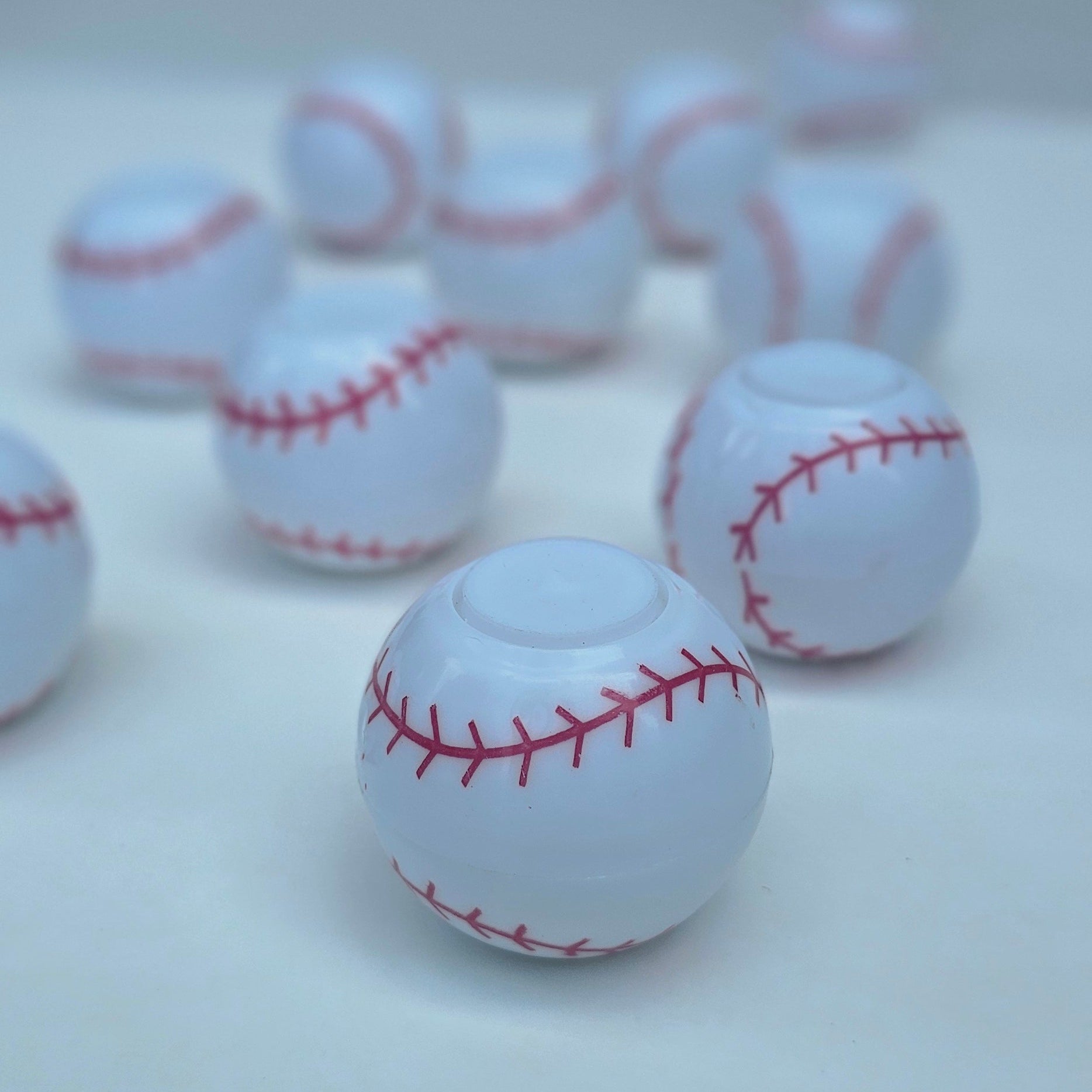 Base ball spinner balls